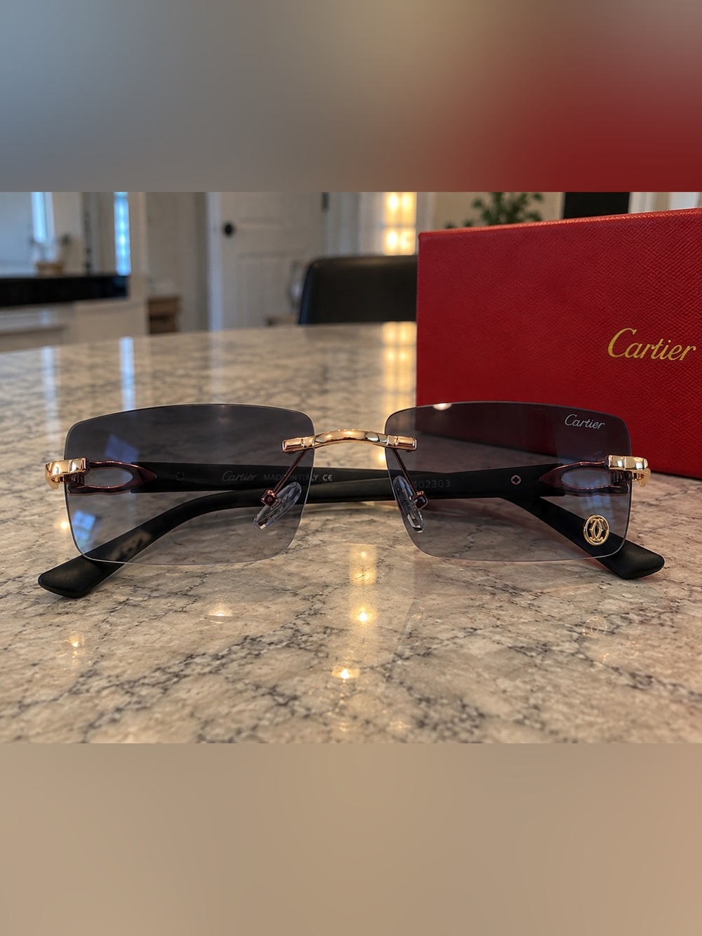 Cartier Rimless Sunglasses in Black and Gold